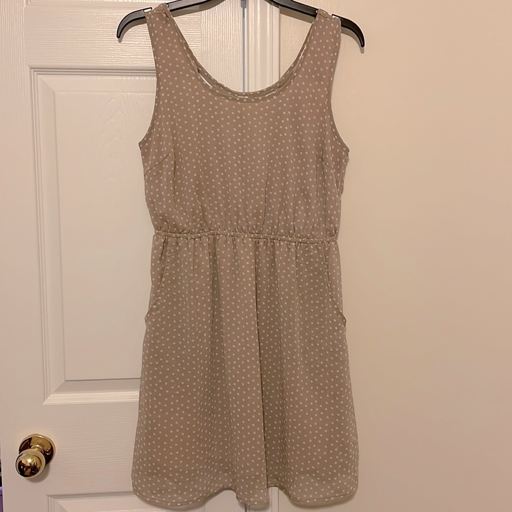 Neutral polka dot sundress with open back